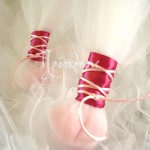 Μπομπονιέρα γάμου τούλινη με δέσιμο φούξια ροζ