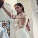 Νυφικό με διαφάνεια σε μπούστο και πλάτη και μαλακή τούλινη φούστα